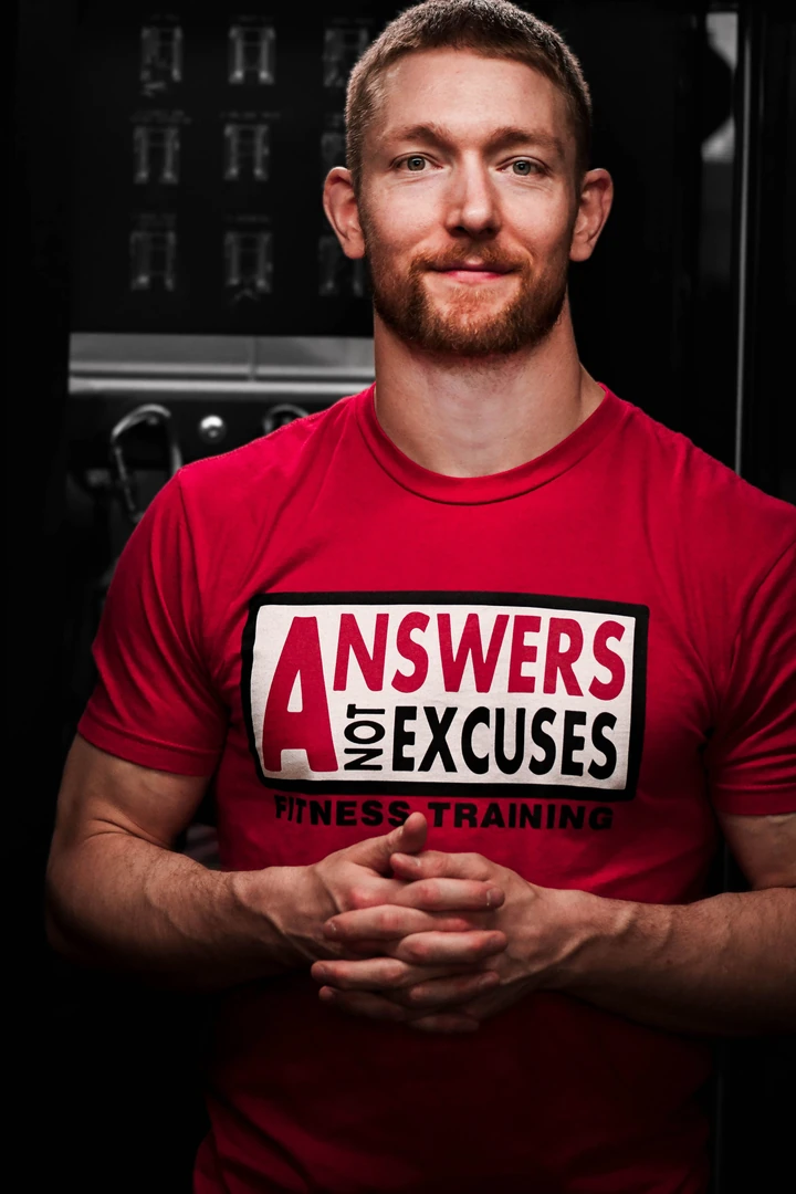 Bennett Dahl wearing an Answers Not Excuses training shirt