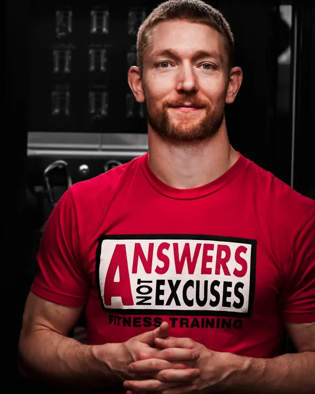 Bennett Dahl wearing an Answers Not Excuses training shirt